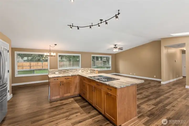 Spacious Kitchen with Island and Dining Area