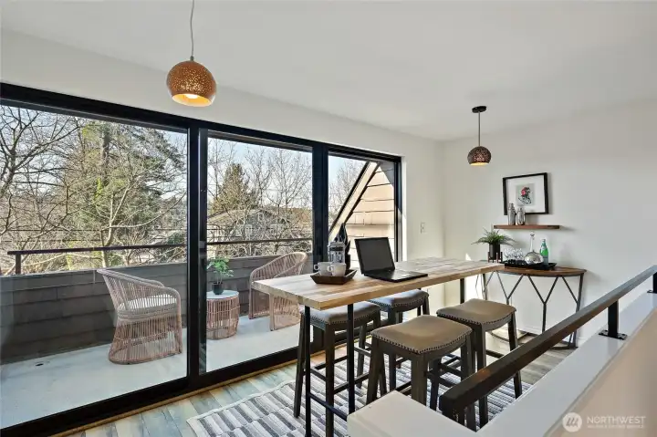 loft office with floor to ceiling glass sliding  door