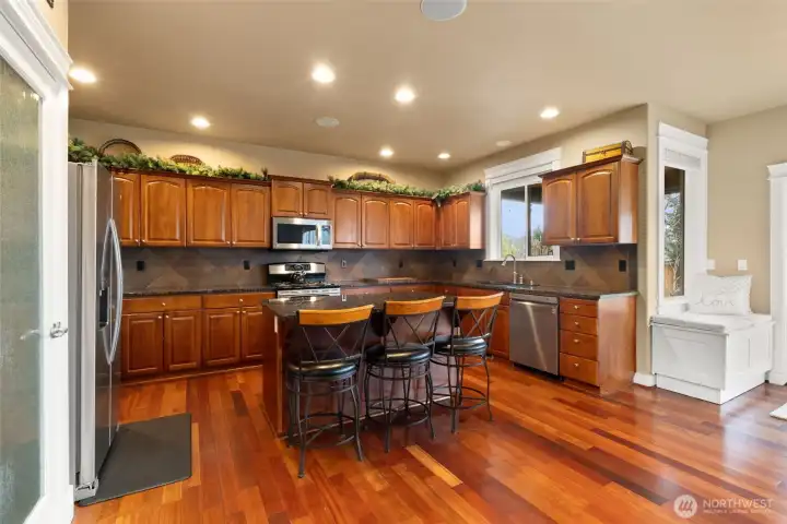Large, open kitchen with ample room for cooking and hosting.