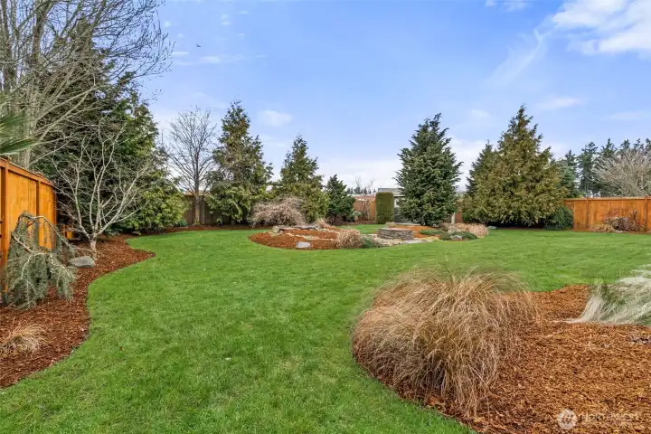 Expansive landscaped yard.