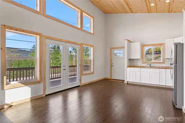 Big windows allow for bright natural light, bringing the outside in.