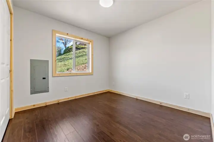 Bedroom tucked away for quiet privacy.