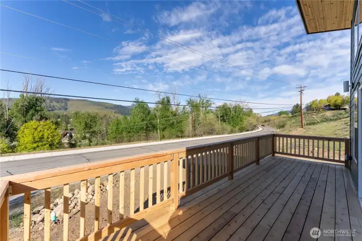 A great deck out front... enjoy your morning cup of coffee and listen to the birds in the cottonwoods.  Easy access into town along the new sidewalk on Castle Ave- a wonderful way to get around town.