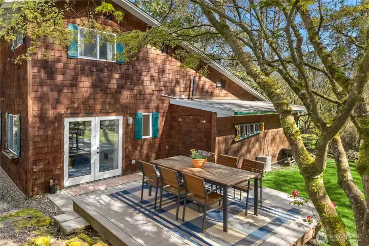 One of two sunny, serene decks overlooks the beautiful natural landscape