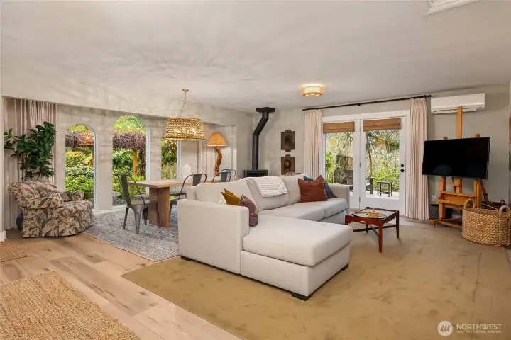 Double doors invite you from the living and dining area out to one of the decks