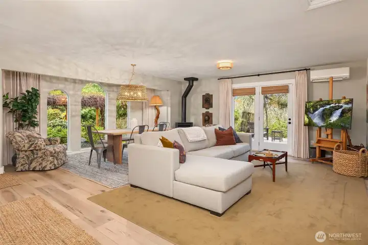 Double doors invite you from the living and dining area out to one of the decks