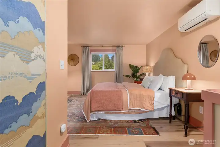 Upstairs is the primary bedroom suite