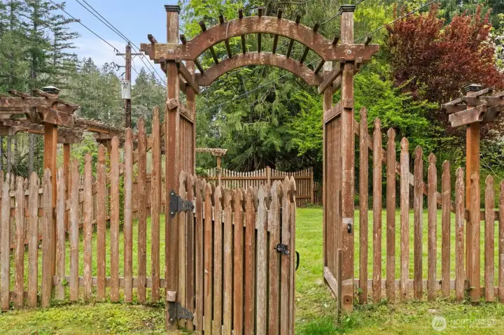 Gated entry from front yard to side yard.
