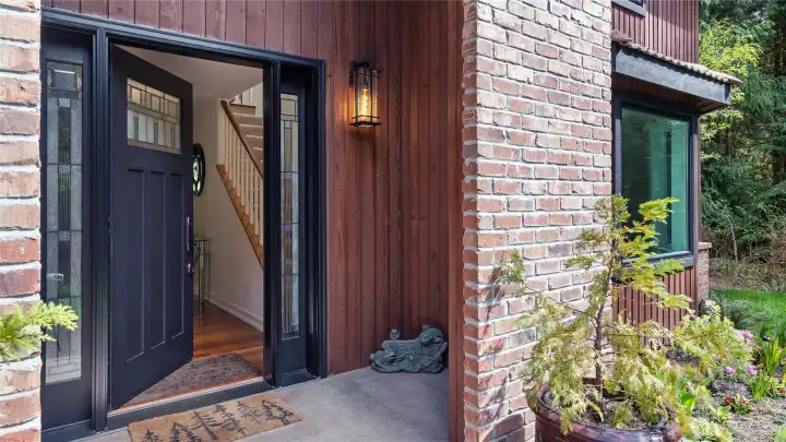 The covered entry draws you in, and the newer front door and exterior lighting offer just a hint of the many thoughtful upgrades waiting inside. It’s a lovely first impression, with even more to appreciate beyond the threshold.