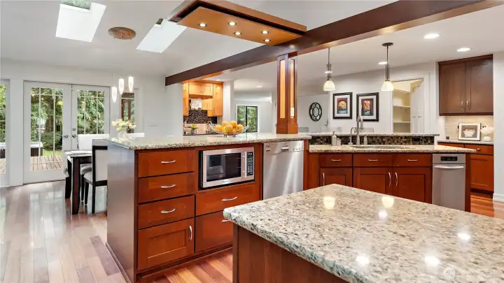 There’s a level of care here that extends all the way to the everyday details, from two skylights that open to an elevated dishwasher and filtered instant hot water at the sink. It’s a kitchen that was clearly designed to be as enjoyable to use as it is beautiful to look at.