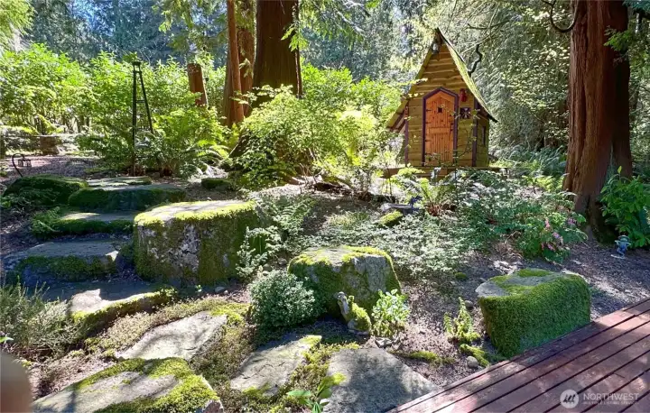 This whimsical shed has a sense of humor all its own, from the crooked faux stovepipe to the delightfully uneven roofline. Add power, bamboo flooring, and windows that open, and suddenly this playful little spot is also wonderfully functional. This whimsical shed has a sense of humor all its own, from the crooked faux stovepipe to the delightfully uneven roofline. Add power, bamboo flooring, and windows that open, and suddenly this playful little spot is also wonderfully functional.