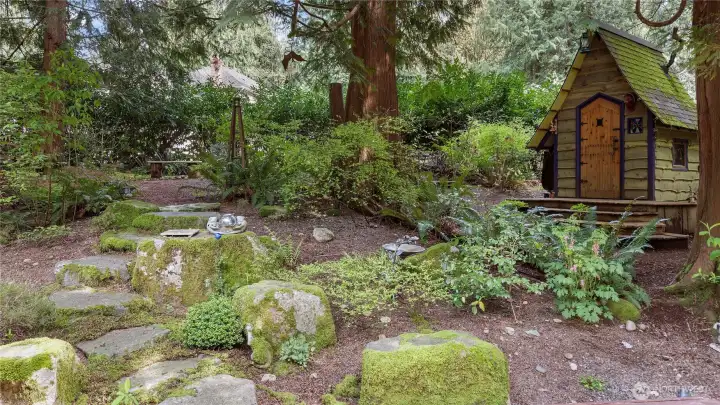 This whimsical shed has a sense of humor all its own, from the crooked faux stovepipe to the delightfully uneven roofline. Add power, bamboo flooring, and windows that open, and suddenly this playful little spot is also wonderfully functional.