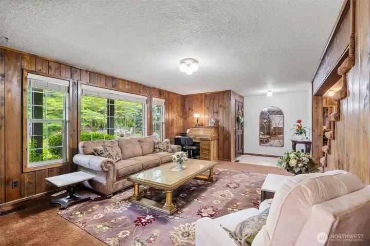 View of the formal living room from the dining room side.