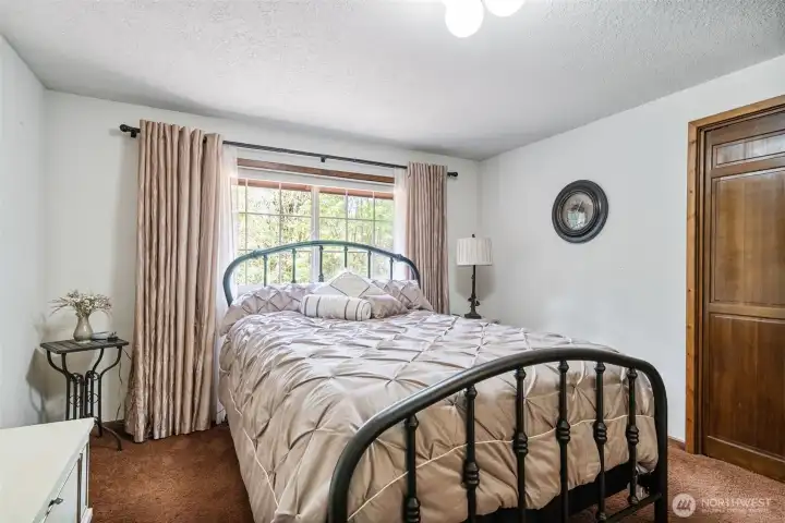 Upstair bedroom number one.  Large closet and looks out into the backyard.