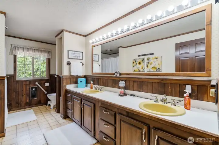 Sweet upstairs full bathroom with double vanities.