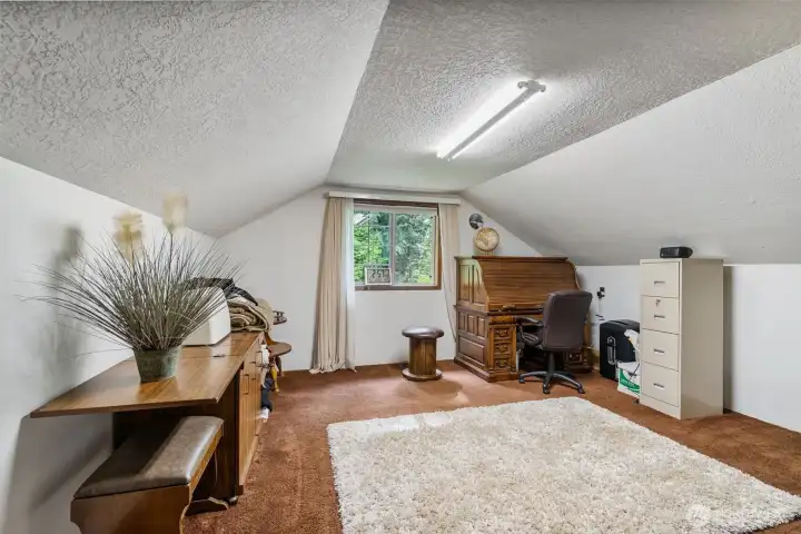 Large office or den.  Can be a great space to work from home.  Or even a great homeschool room.