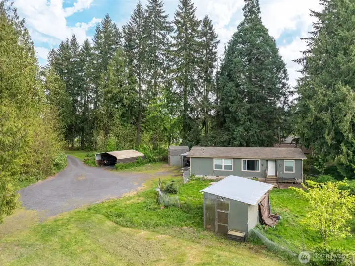 Lovely DADU manufactured home.  Comes with a carport and chicken coop.  The sellers will even leave the chickens.  Daily farm fresh eggs, waiting for you.