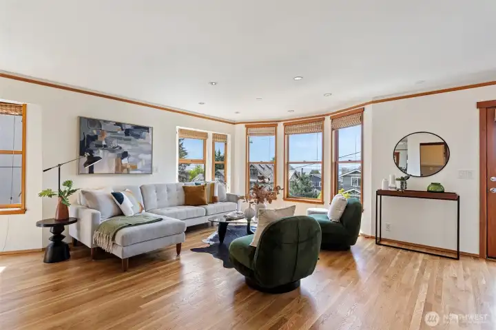 Spacious living room w/ Elliott Bay and Olympic mountain views (upper level 2)
