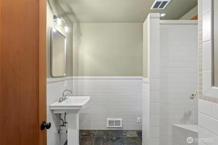 3/4 ensuite bath to bedroom 4 (main level)
