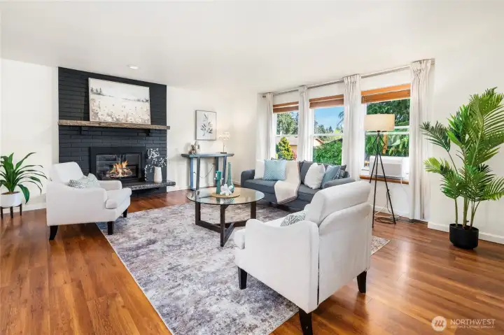 Living room with gas log fireplace.