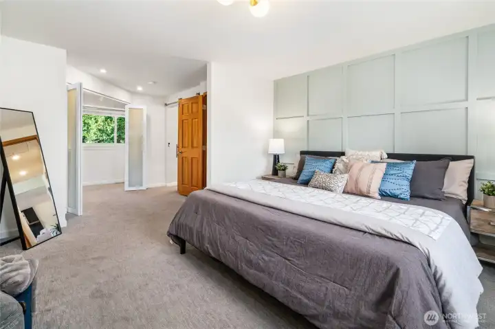 Large primary suite with walk-in closet and en suite bath.