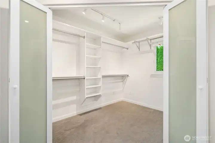Plenty of space and storage in the primary walk-in closet.