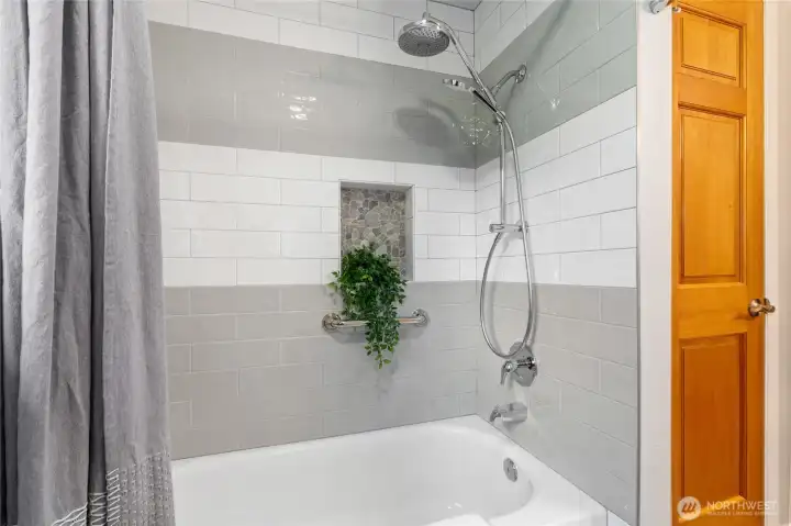 Main floor bathtub and linen closet.