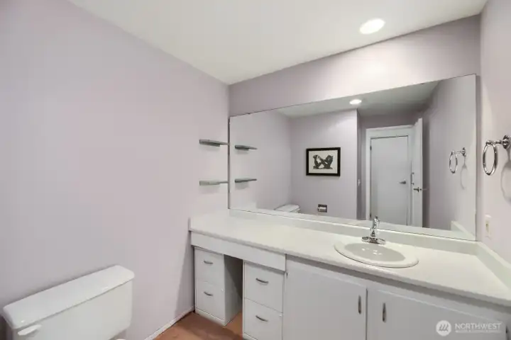 Powder room on upper floor with living, dining, kitchen. Powder room on upper floor with living, dining, kitchen.