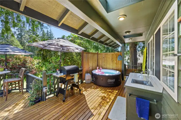 Covered deck with private hot tub