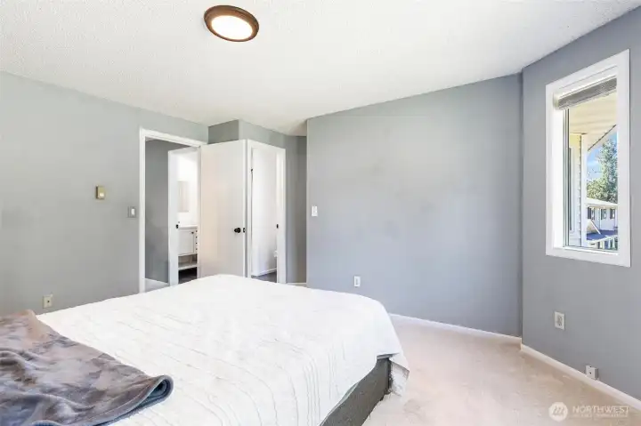 Primary Bedroom w/ access door to bathroom