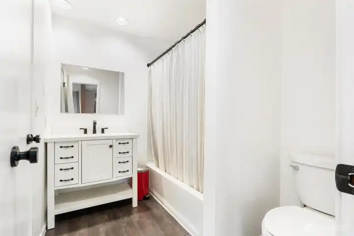 Door to full bathroom from primary bedroom