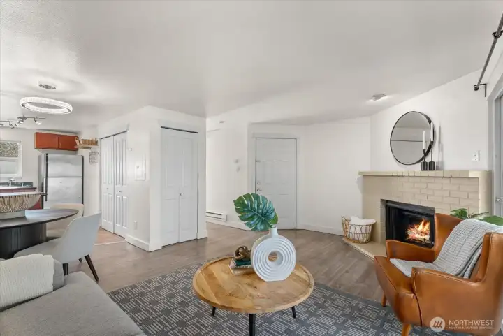 Spacious and bright living room opening up to a large balcony and backyard.
