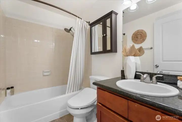 Full bathroom with shower/tub.