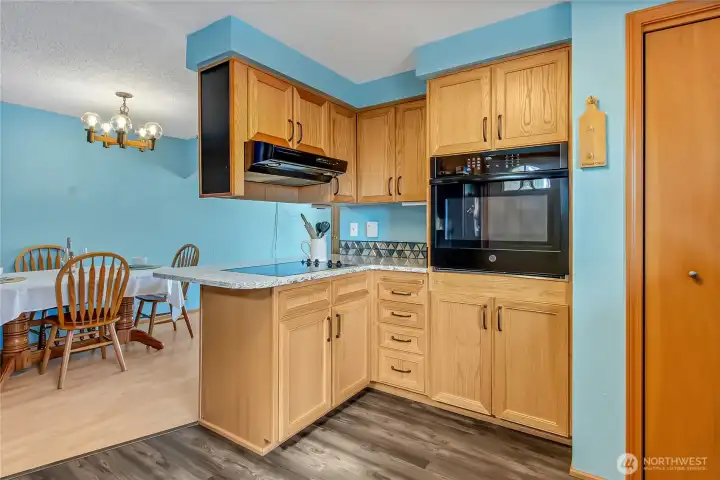Kitchen boasts wall oven at perfect height