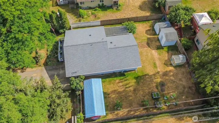 Home, boat/car port large fenced back yard and storage sheds