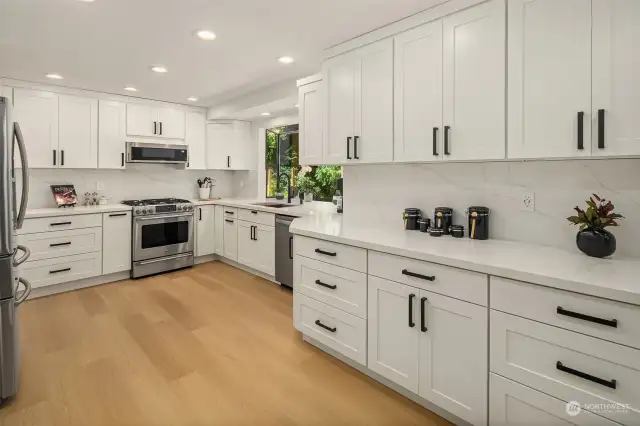 A stunning, brand new full kitchen remodel highlights this home