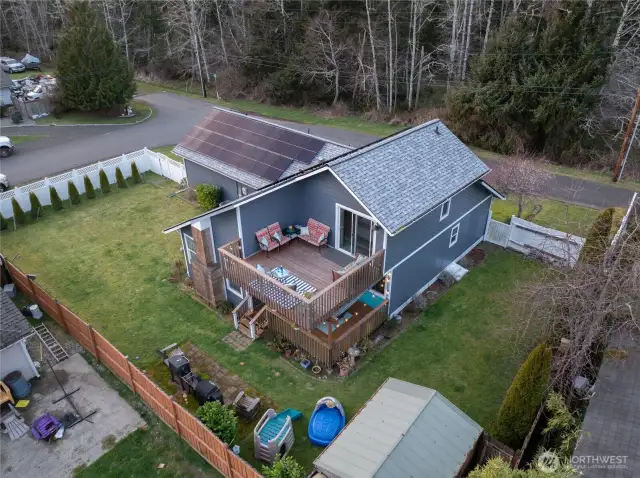 Large fenced yard and double deck for entertaining! Solar panels provide year round income producing power.