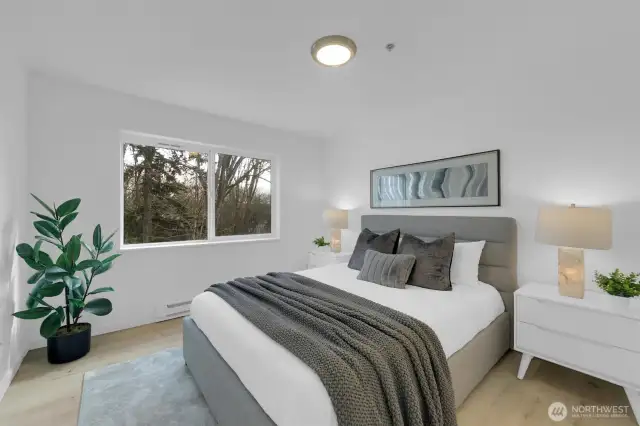 Wake up to nature! This end-unit condo offers unmatched privacy and a prime top-floor location.