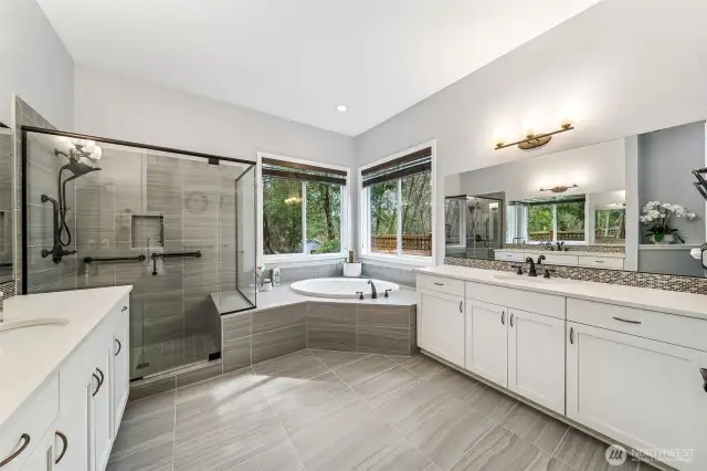 Primary Bath with oversized shower, soaking tub, separate sinks and loads of counterspace!