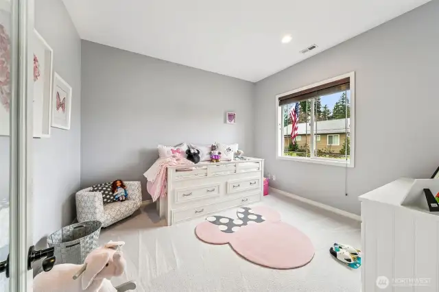 Den/ office off entry with glass french doors.