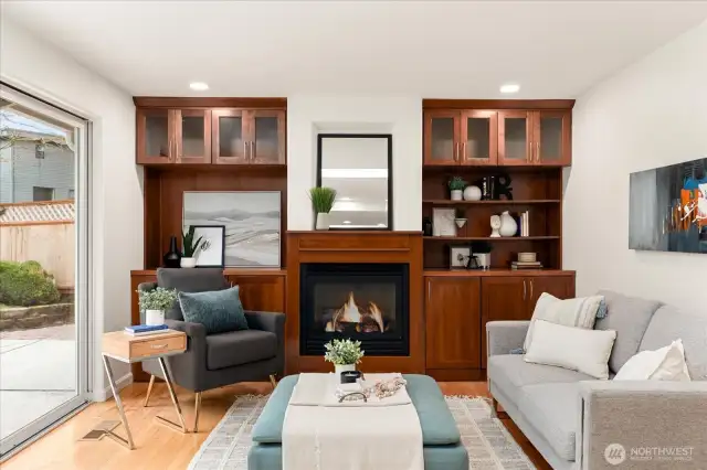 Second living room with elegant built-in shelves adds charm and function