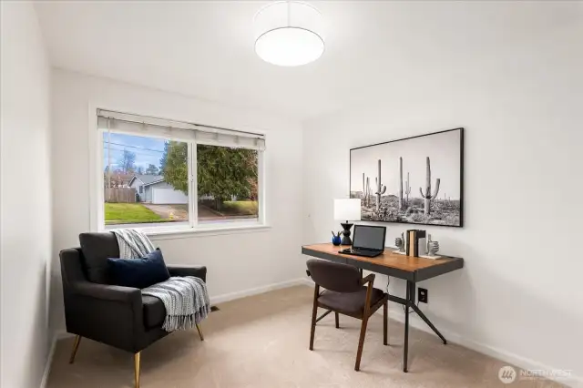 Bedroom 3 doubles perfectly as a home office or guest space.