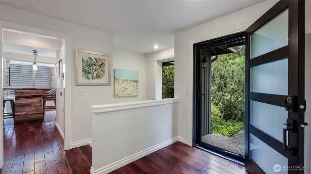 Gorgeous updates throughout including hickory hardwood floors throughout most of the main level.