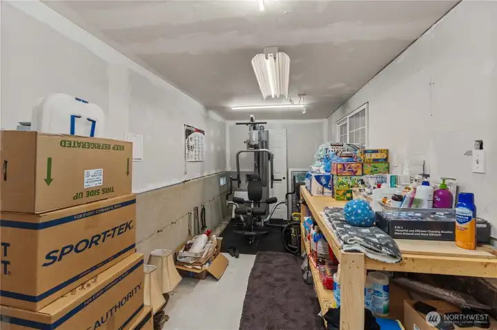 Bonus storage or exercise room or work bench area off the primary suite!
