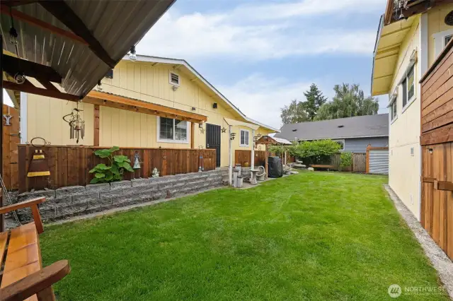 Private backyard between the house and the garage.