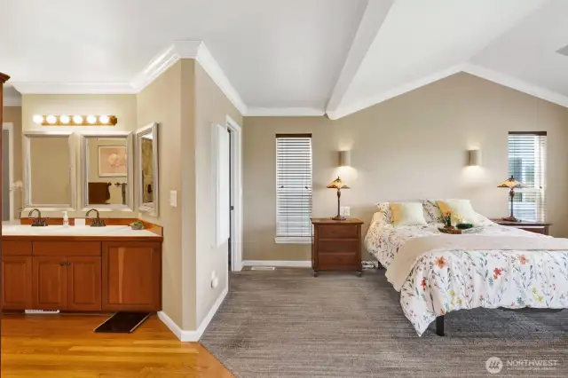 The primary suite is accessed through the French doors in the breakfast room.