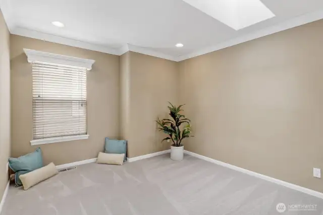 Bedroom 3 on the upper level includes a skylight.