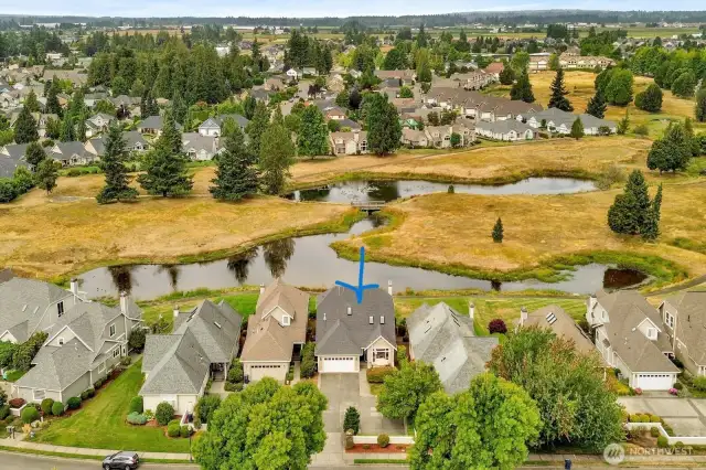 4 homes share a courtyard/driveway with 4 extra parking spots behind the fence.