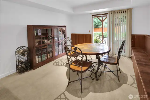 Lower level gaming area room  for card table, billiards, off large patio and sliding door to park-like yard.