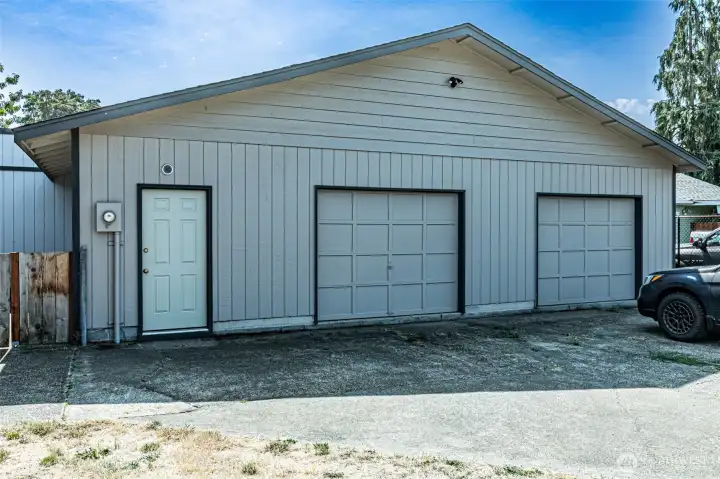 Right side of the garage is tandem length.  Shop on left with half bath.  Check for zoning to make it a DADU.